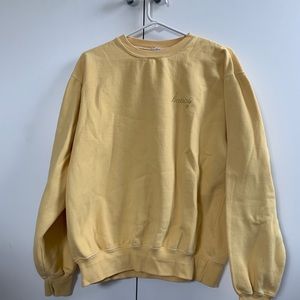 brandy melville yellow ‘honey’ crewneck